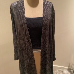 Black and silver foil evening jacket, beautiful paper thin ,stretchy. Stretchy.